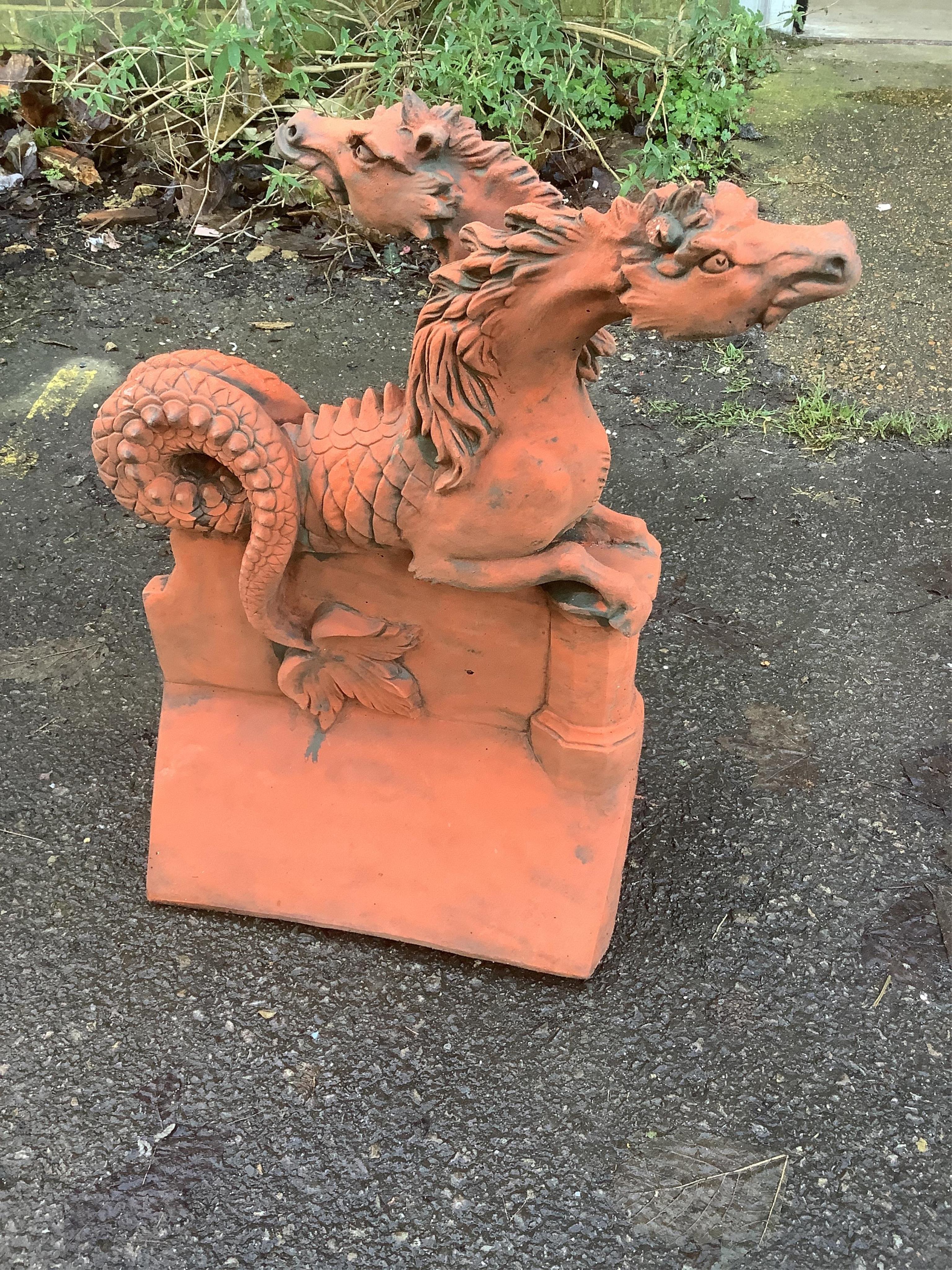 Three terracotta ridge tiles. Condition - largest height 52cm. Condition - fair to good